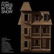 Foxes In The Snow